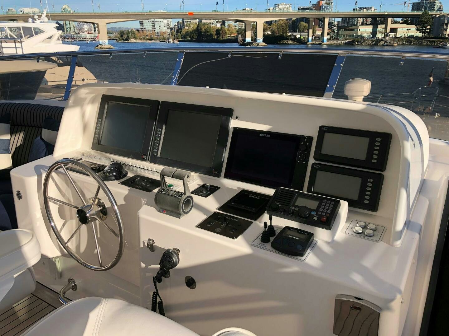 a white table with black laptops and monitors on it aboard ENCHANTRESS Yacht for Sale