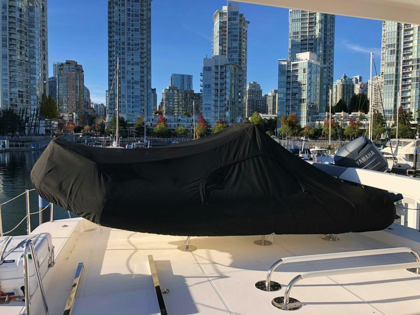 a black umbrella on a deck aboard ENCHANTRESS Yacht for Sale