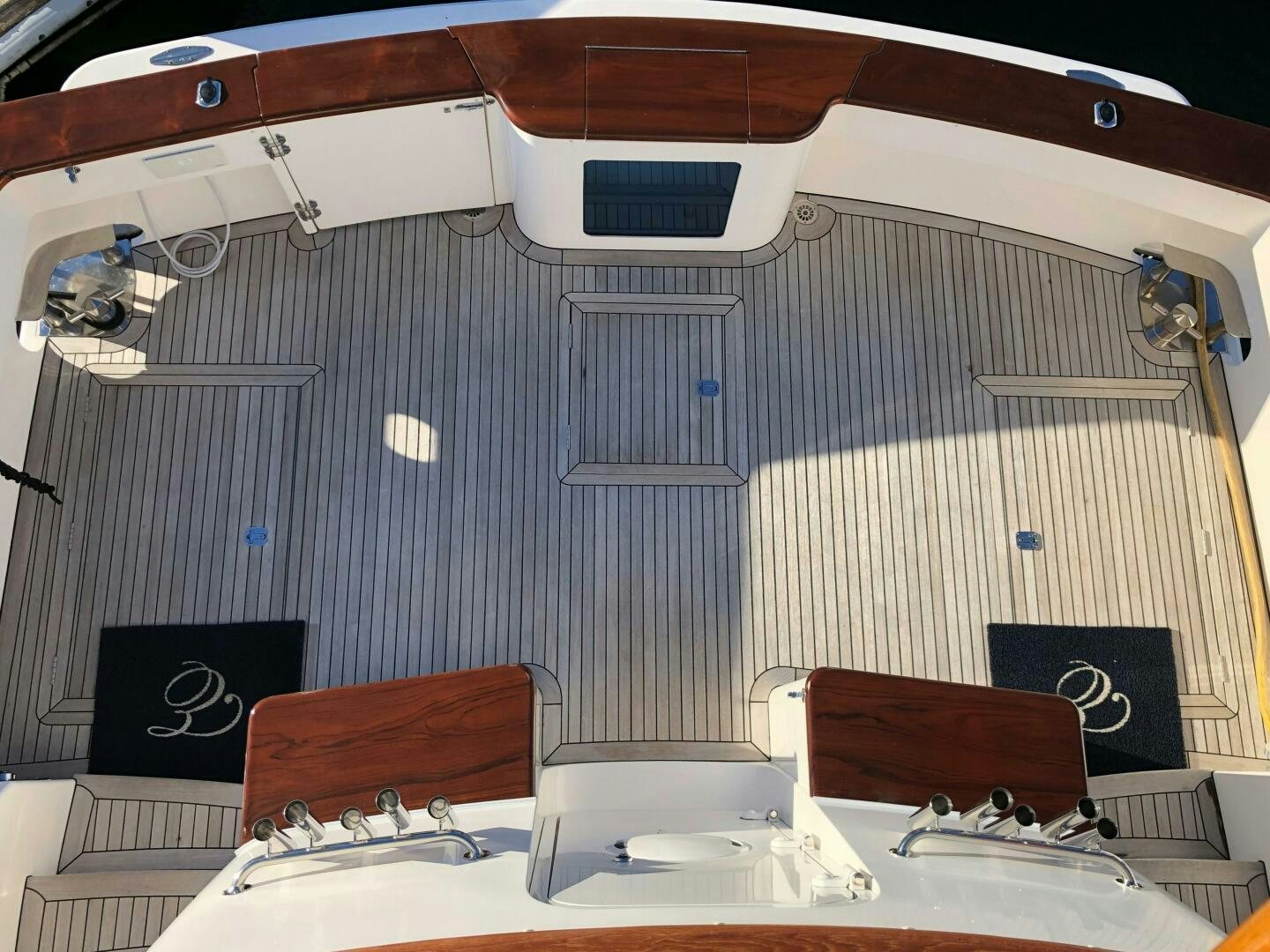 a group of laptops on a table aboard ENCHANTRESS Yacht for Sale