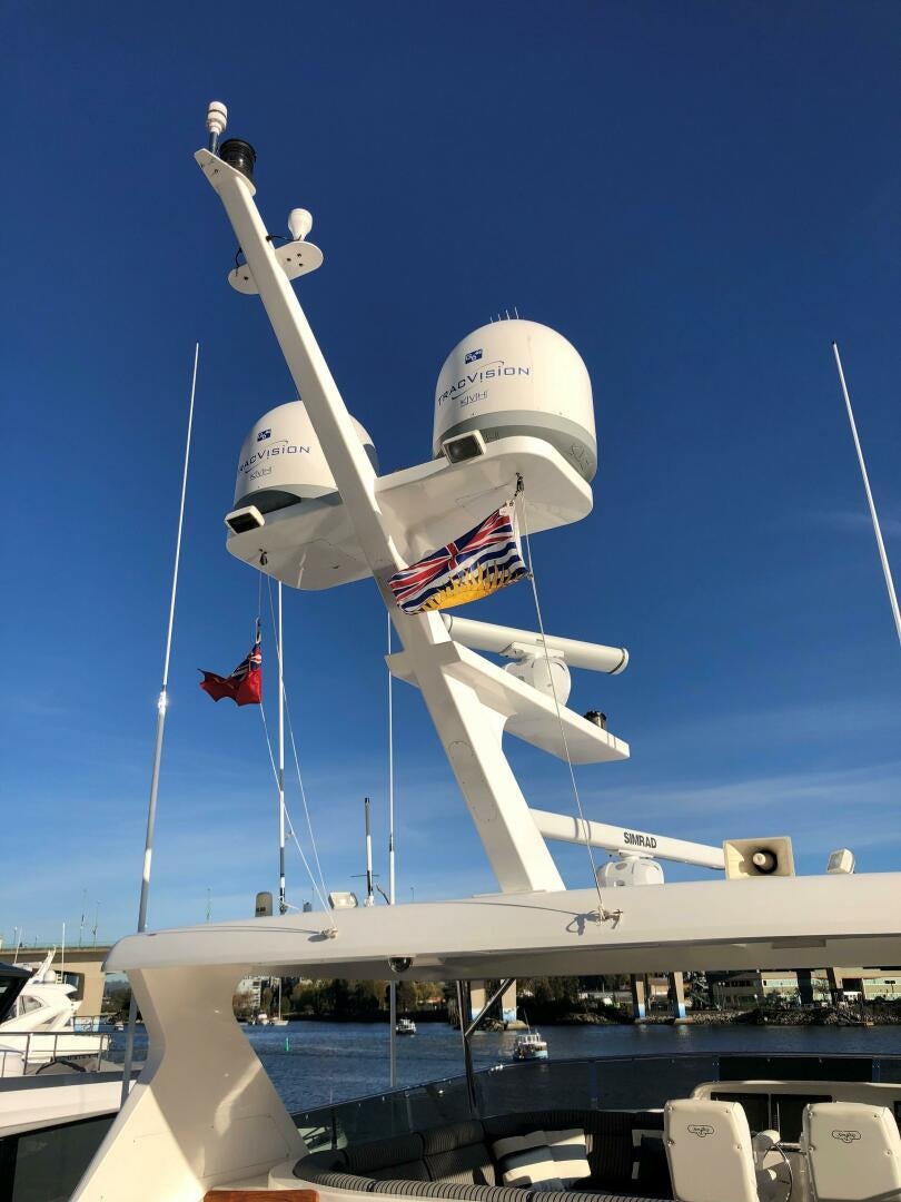 a couple of white airplanes on a dock aboard ENCHANTRESS Yacht for Sale