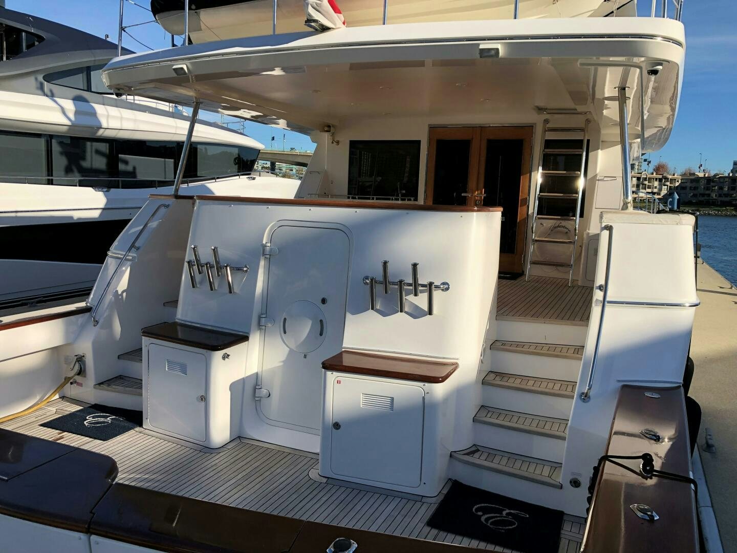 a boat with a stack of wood aboard ENCHANTRESS Yacht for Sale