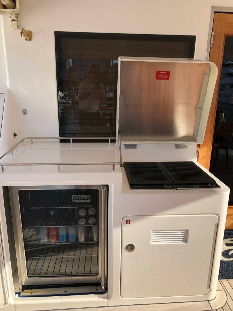 a microwave oven with a door open aboard ENCHANTRESS Yacht for Sale