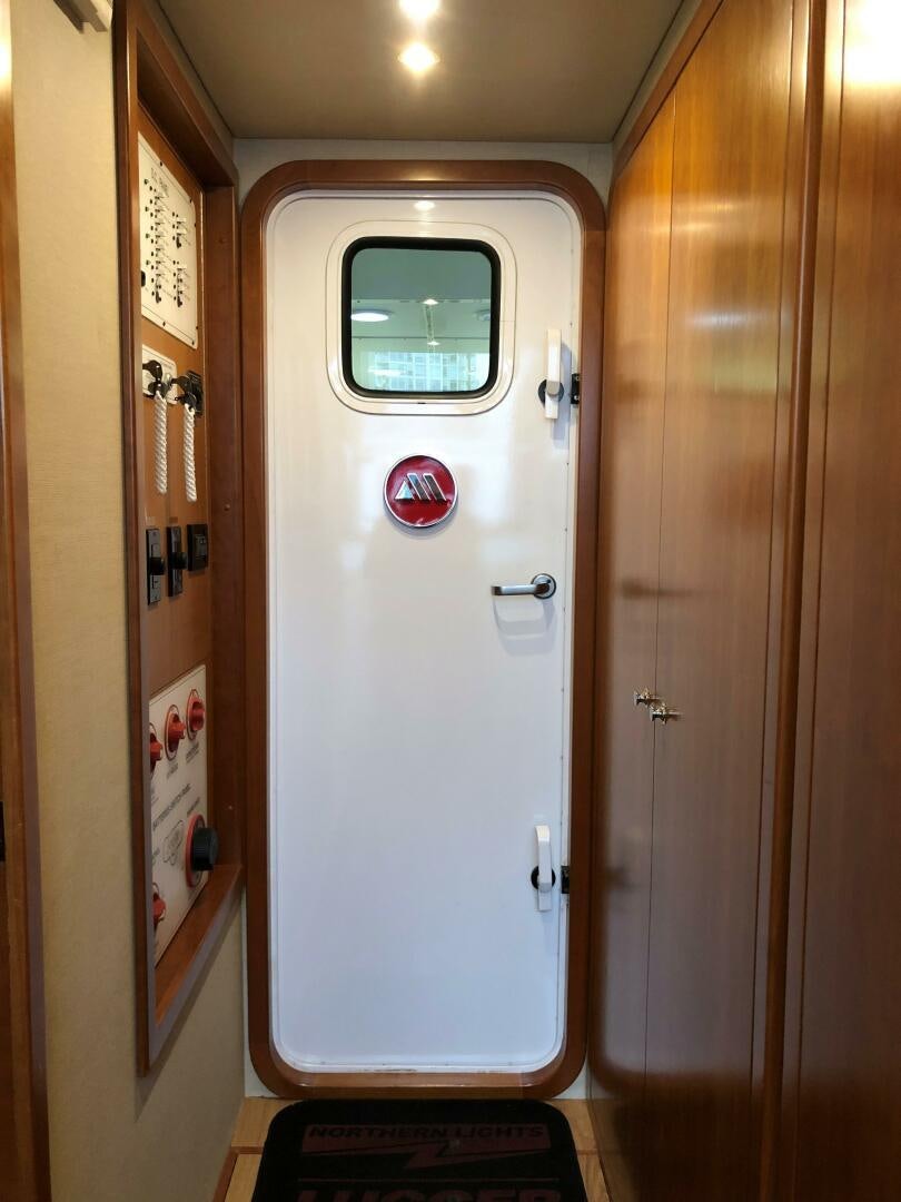 a door with a lock aboard ENCHANTRESS Yacht for Sale