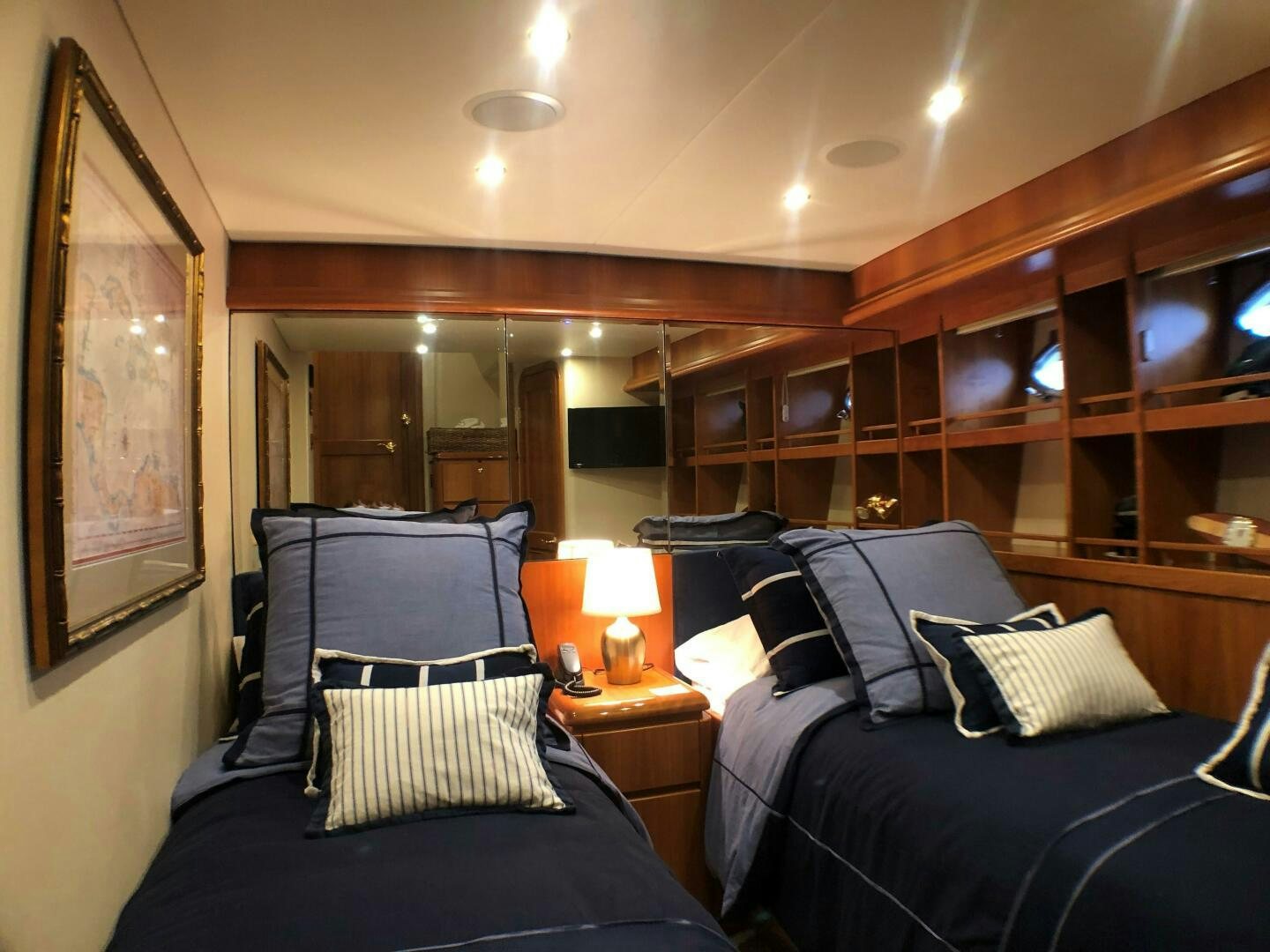 a couple of beds in a room aboard ENCHANTRESS Yacht for Sale