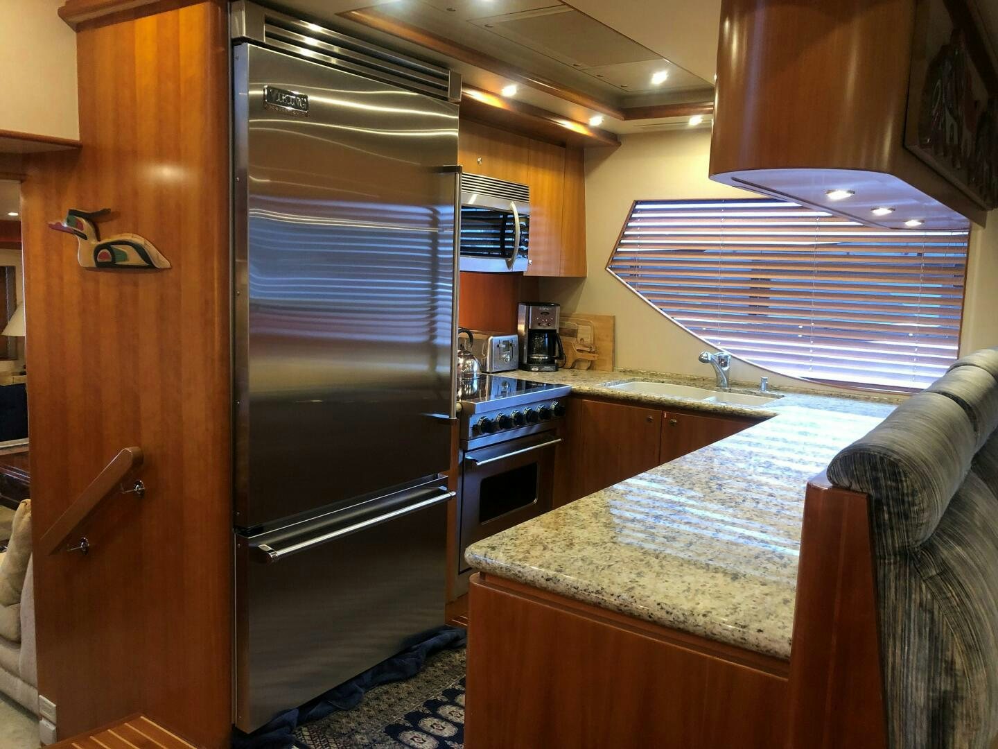 a kitchen with a large oven aboard ENCHANTRESS Yacht for Sale
