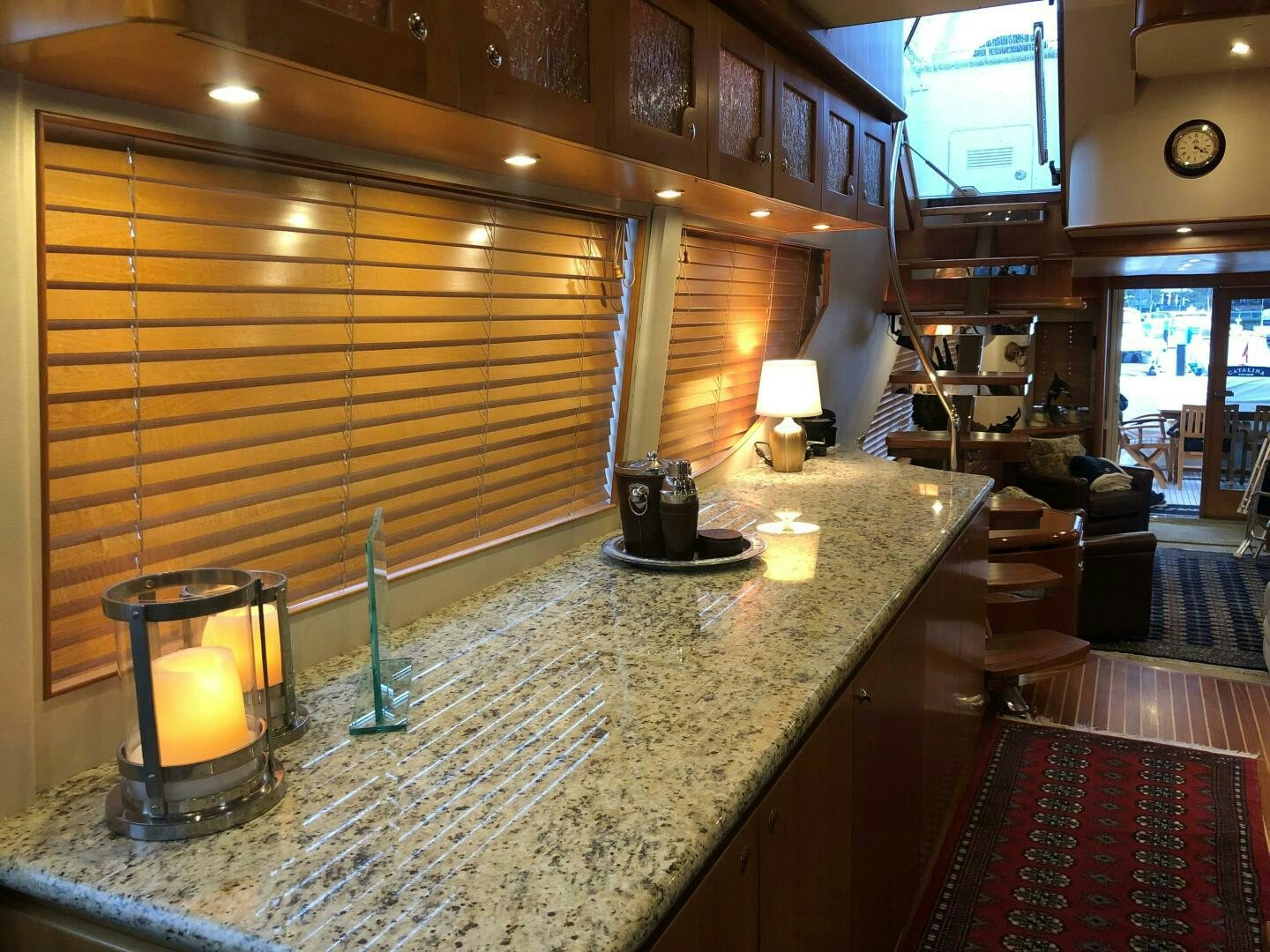 a large kitchen with a large marble counter top aboard ENCHANTRESS Yacht for Sale