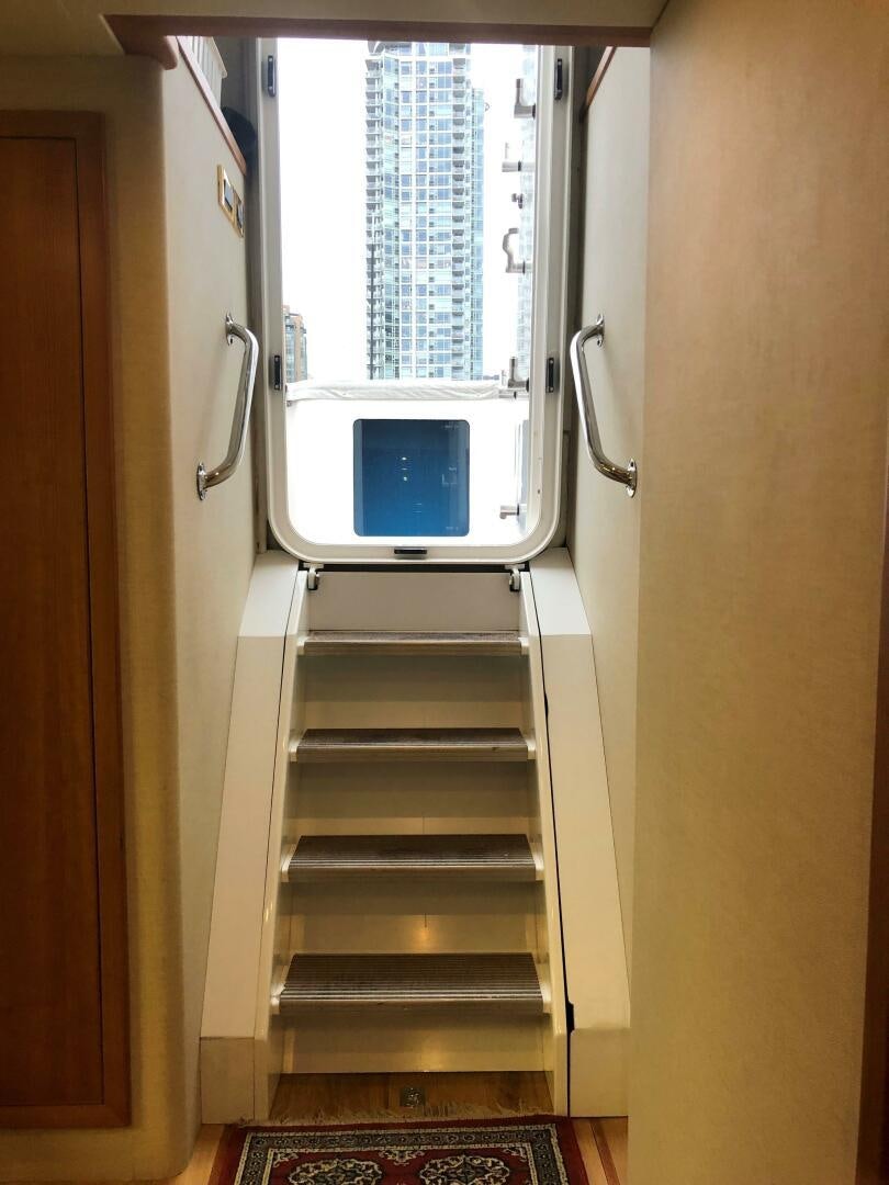 a closet with a computer on it aboard ENCHANTRESS Yacht for Sale