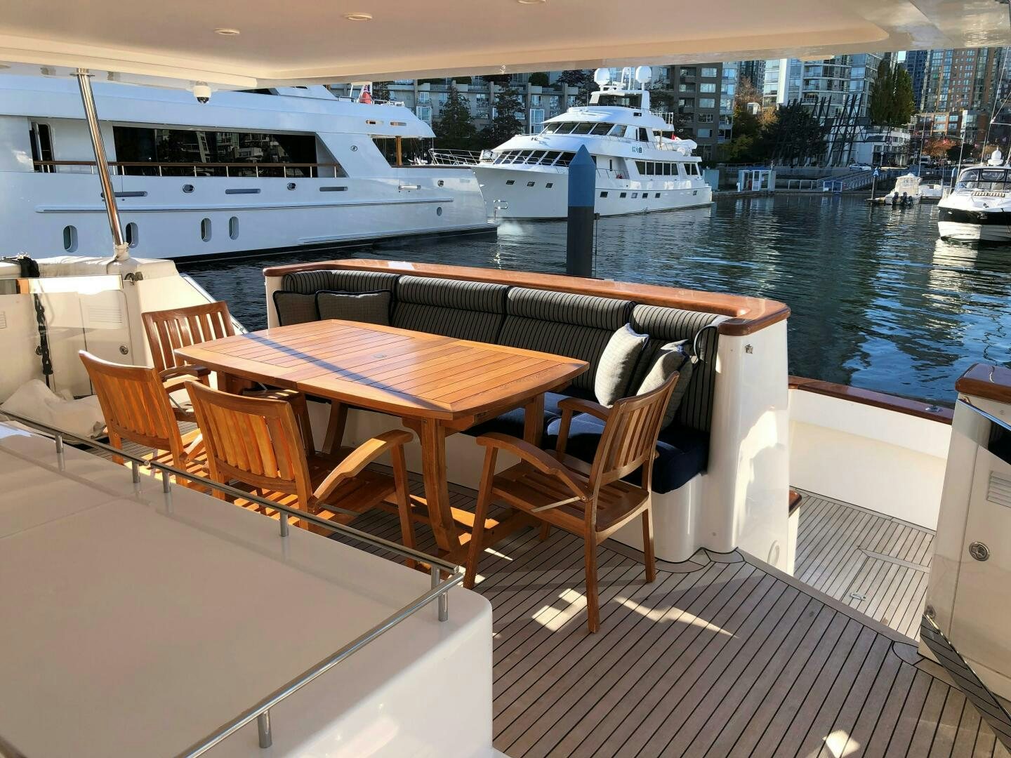 a table and chairs on a boat aboard ENCHANTRESS Yacht for Sale