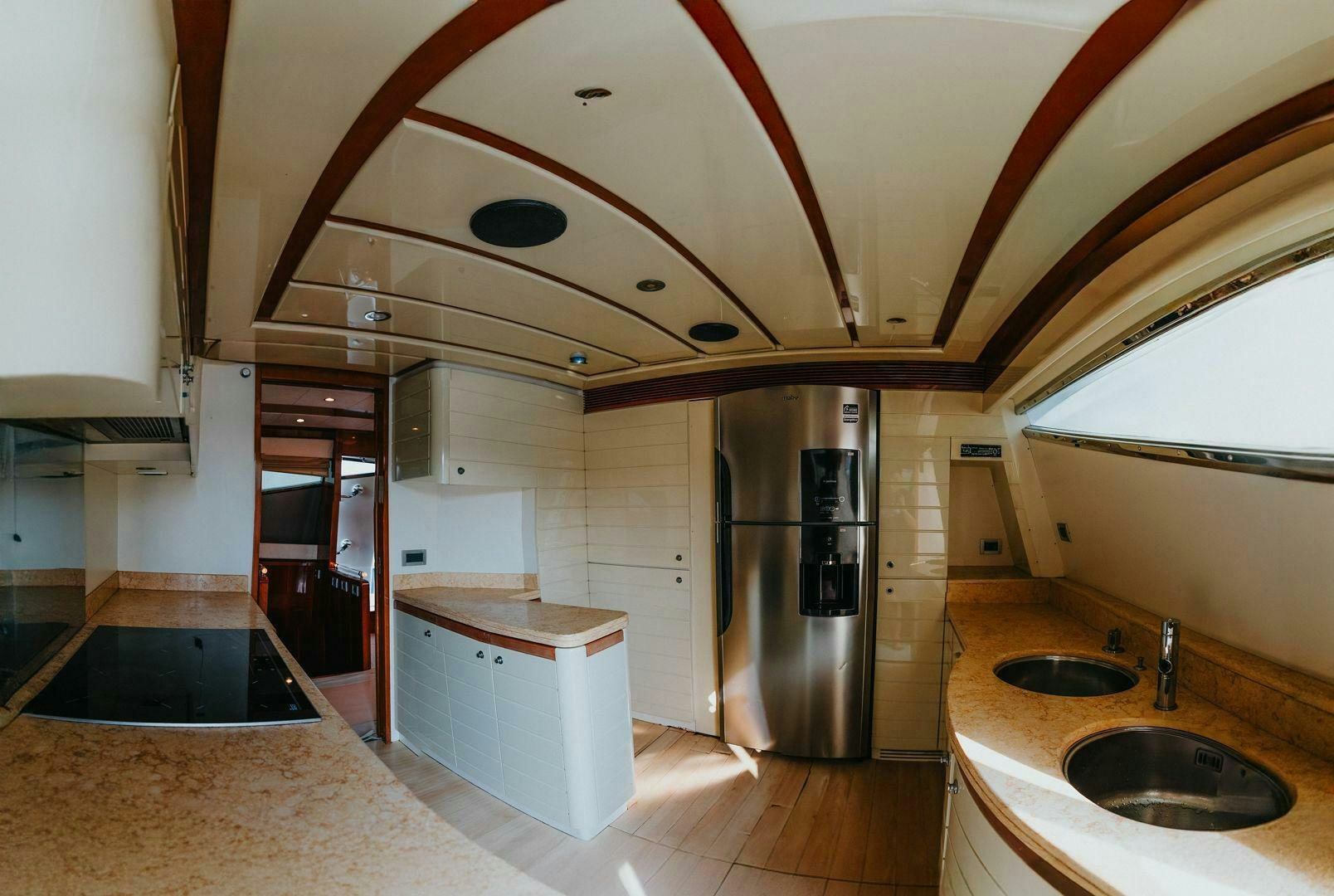 a modern looking kitchen aboard LOS ESQUINKLES Yacht for Sale