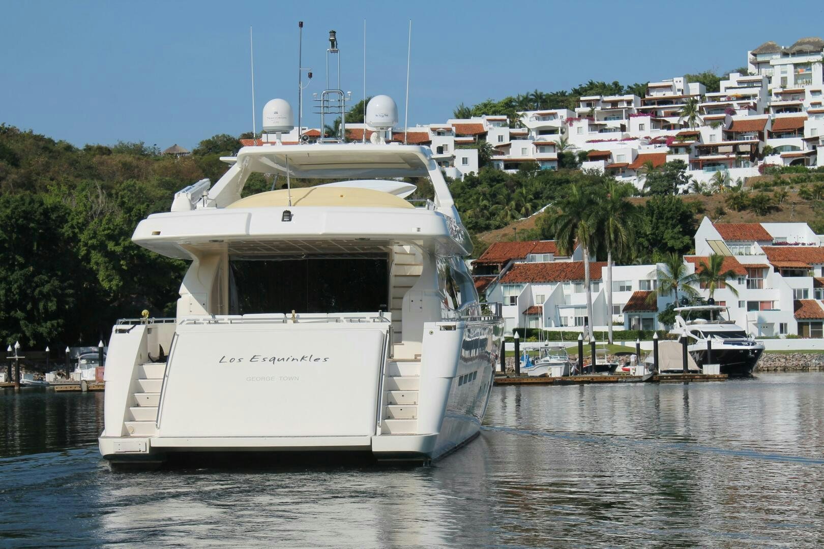 a white boat in the water aboard LOS ESQUINKLES Yacht for Sale