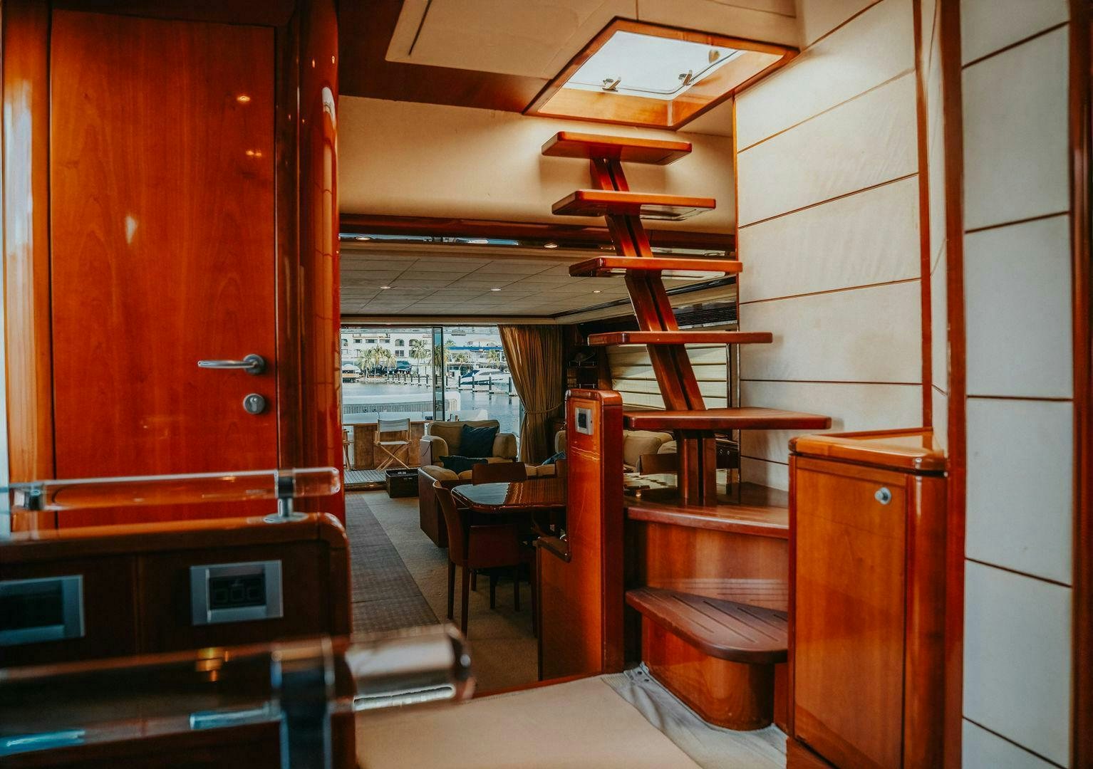 a room with wooden furniture aboard LOS ESQUINKLES Yacht for Sale