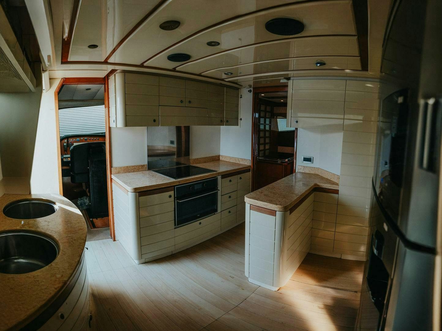 a kitchen with a sink and stove aboard LOS ESQUINKLES Yacht for Sale