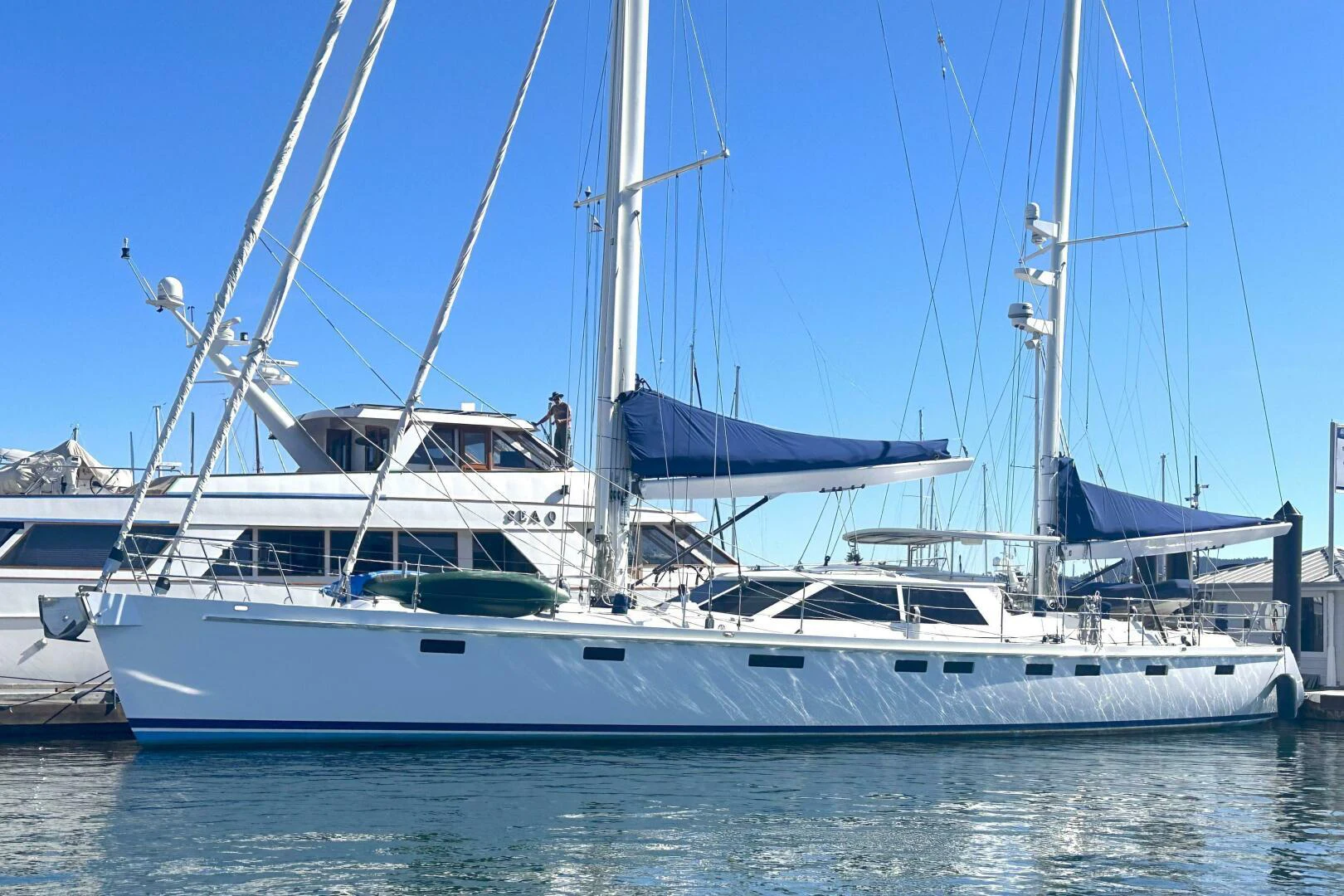 a white yacht in the water aboard LEONORE Yacht for Sale