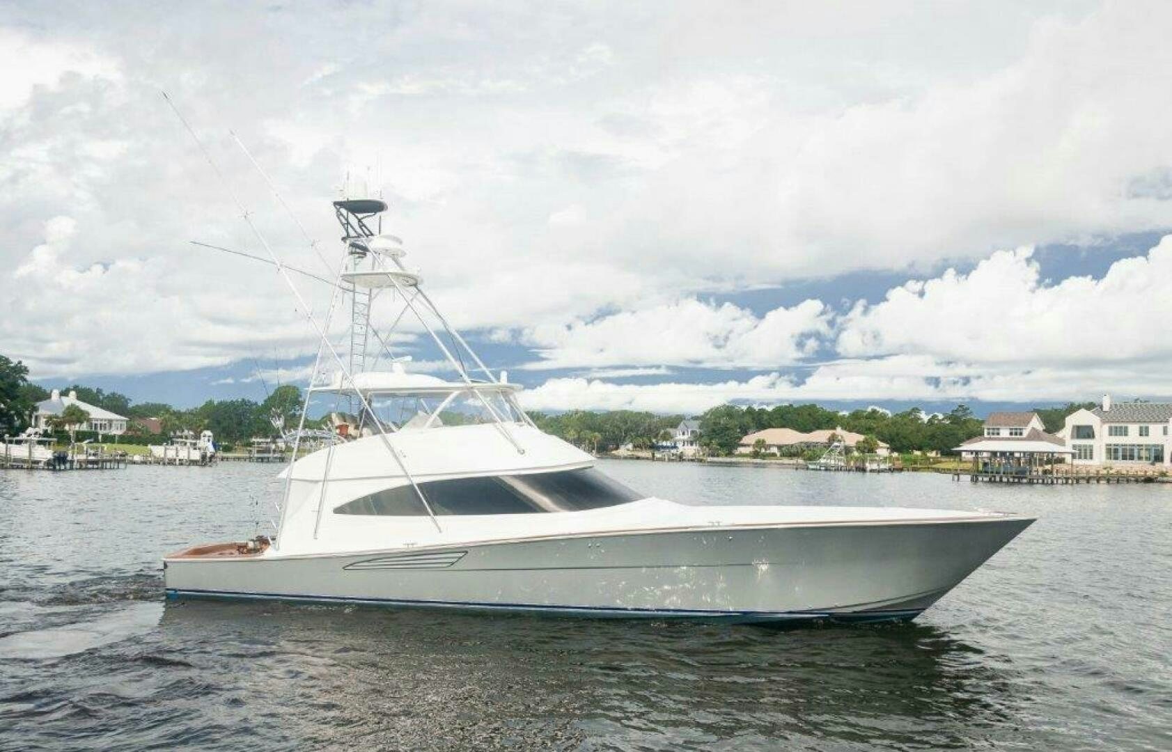 a white yacht in the water aboard GUNNSLINGER Yacht for Sale