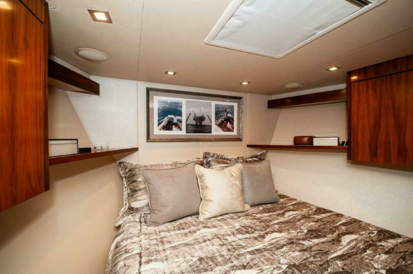 a bed with pillows aboard GUNNSLINGER Yacht for Sale