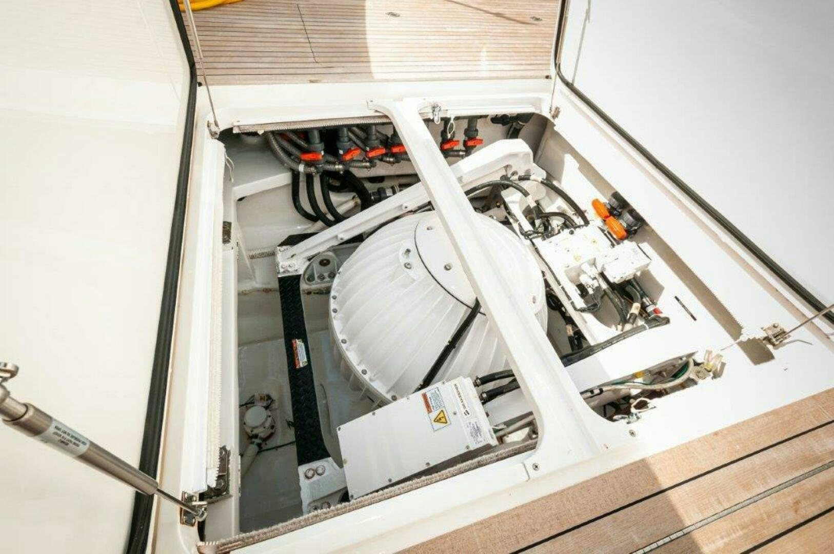 a machine with a white cylinder aboard GUNNSLINGER Yacht for Sale