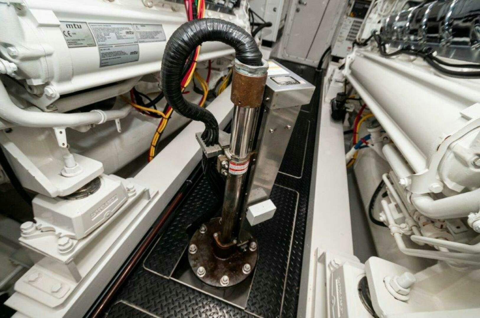 a machine with a metal handle aboard GUNNSLINGER Yacht for Sale