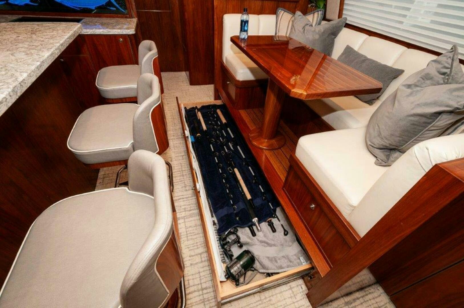 a chair and a table in a room aboard GUNNSLINGER Yacht for Sale