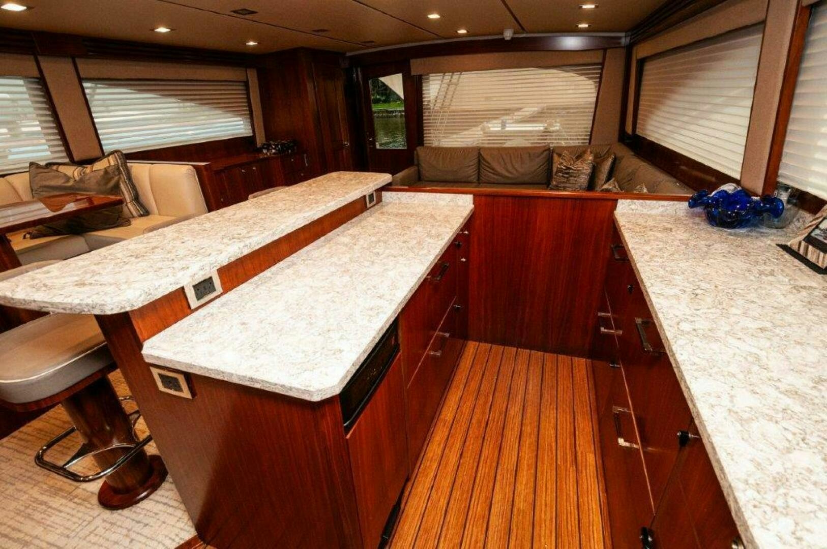a kitchen with a large island aboard GUNNSLINGER Yacht for Sale