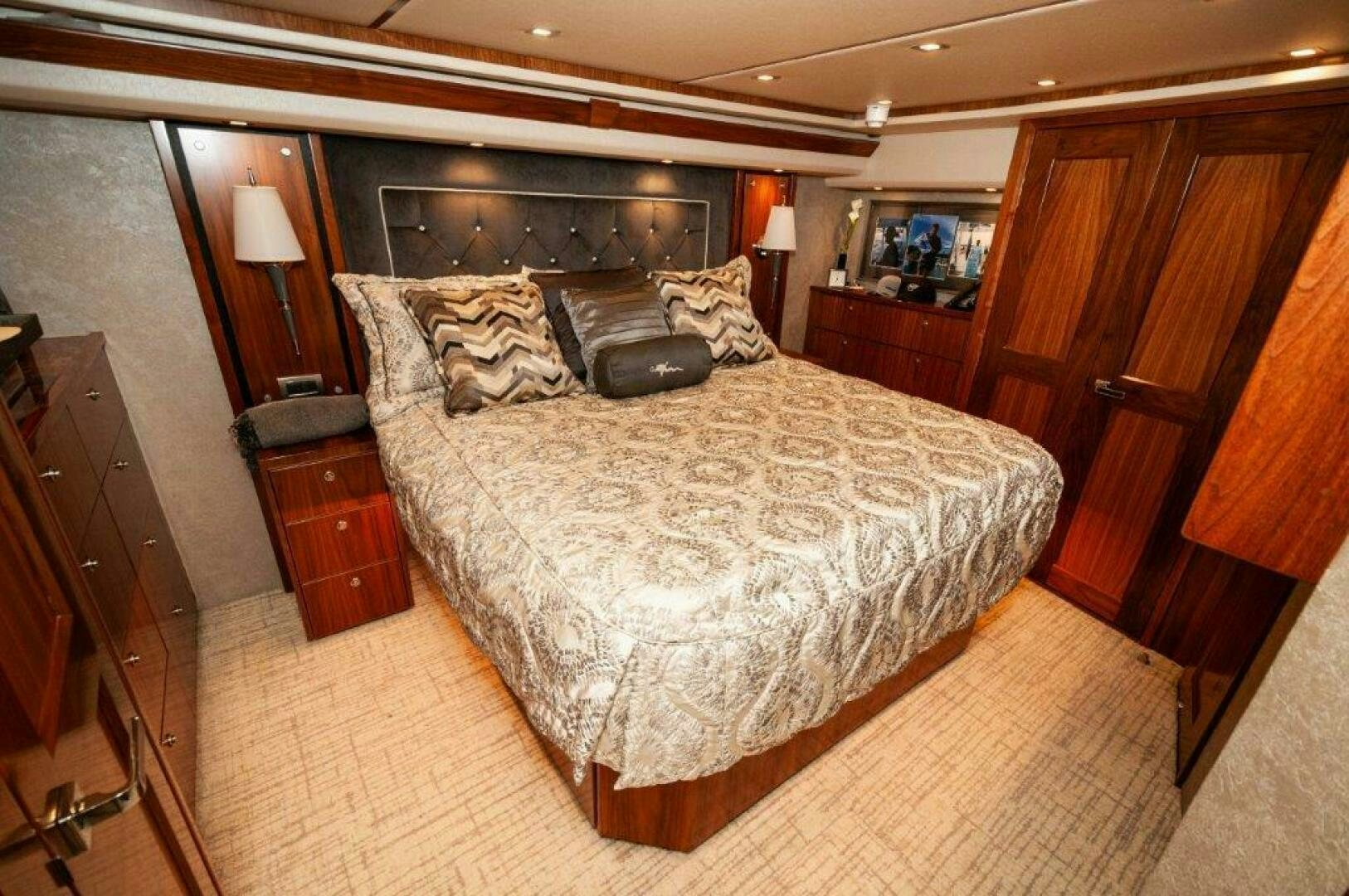 a large bed in a hotel room aboard GUNNSLINGER Yacht for Sale