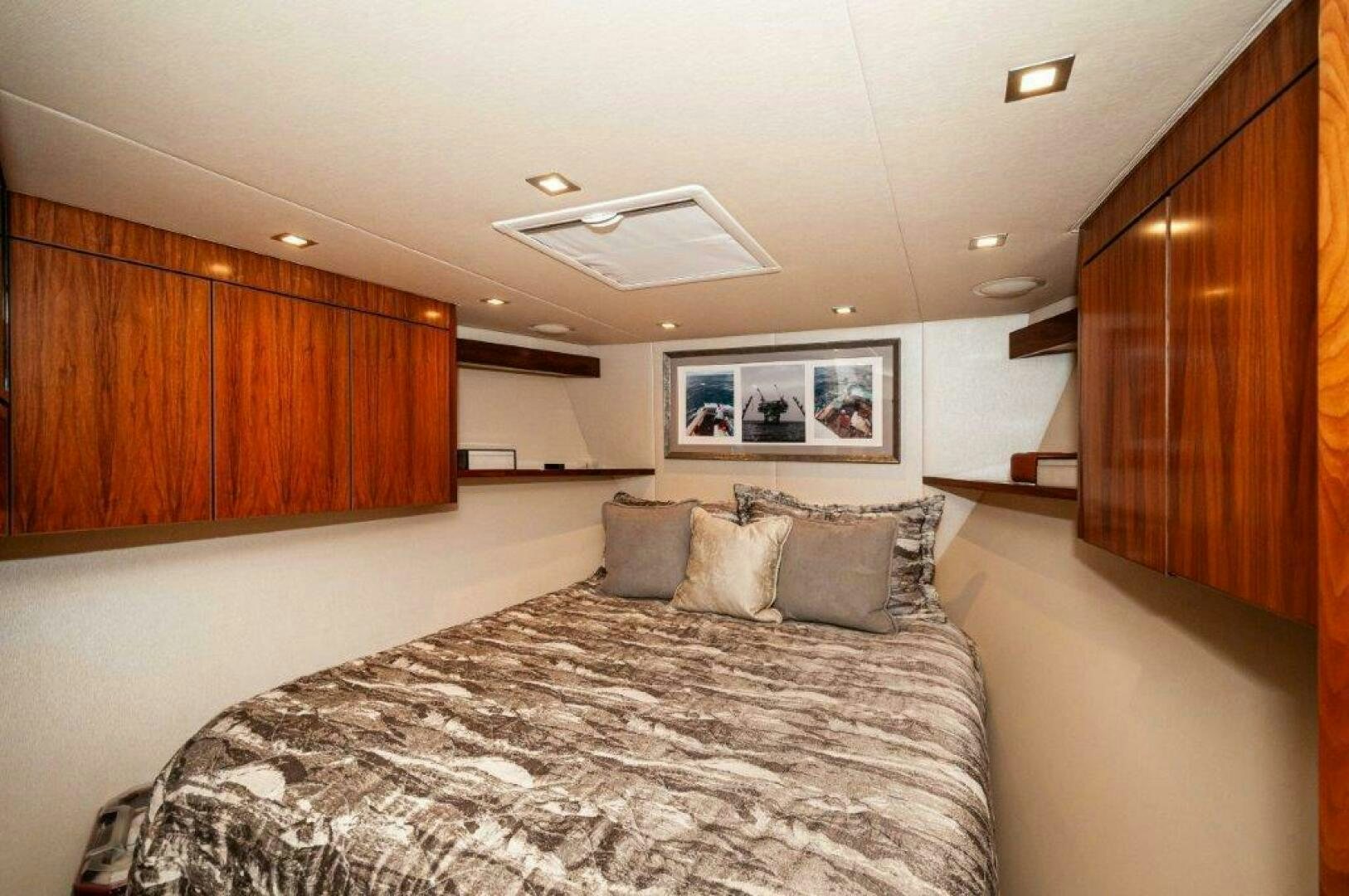 a bed in a room aboard GUNNSLINGER Yacht for Sale