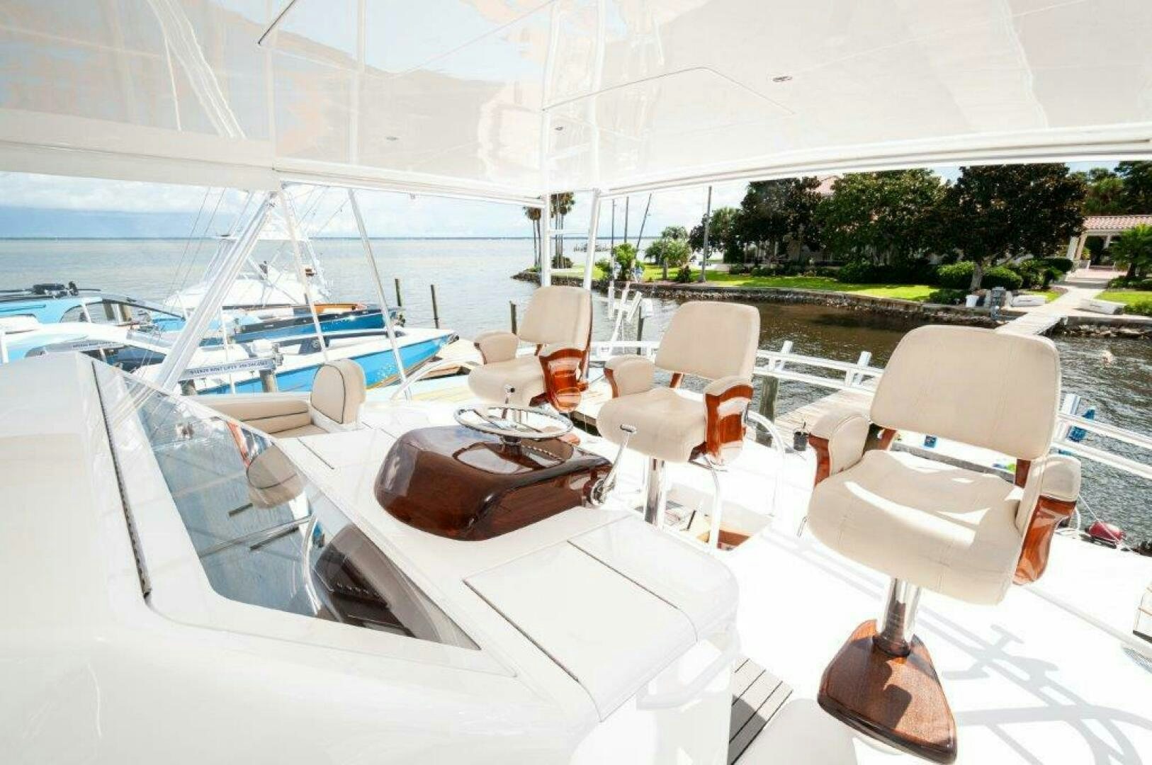 a boat with chairs on it aboard GUNNSLINGER Yacht for Sale