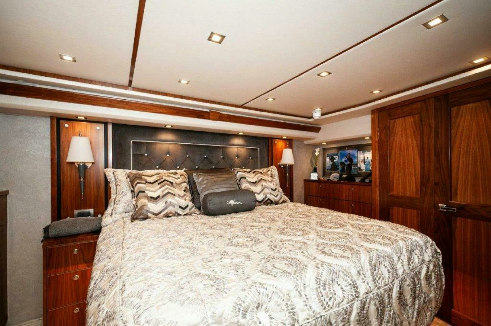 a bed with a pillow on it aboard GUNNSLINGER Yacht for Sale