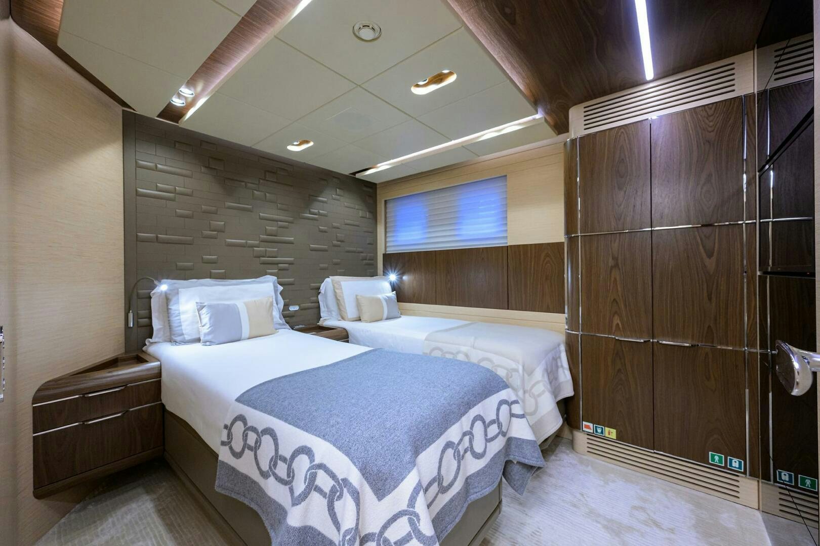 a room with two beds aboard UPTIGHT Yacht for Sale