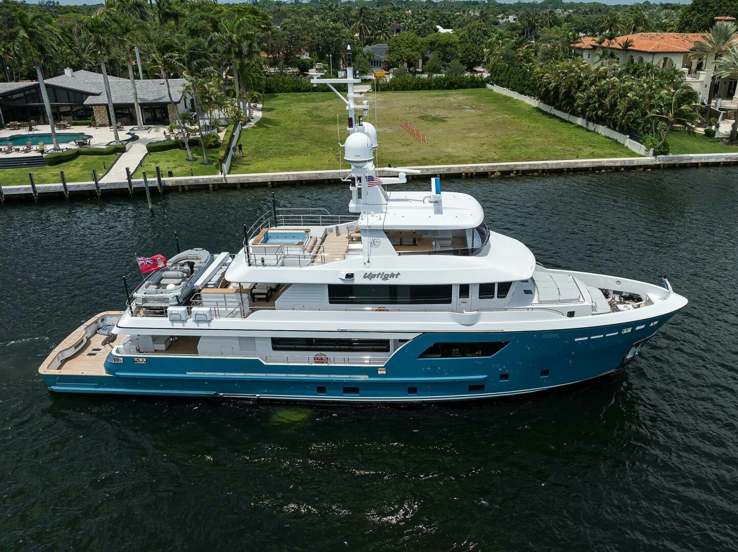 a large boat in a body of water aboard UPTIGHT Yacht for Sale