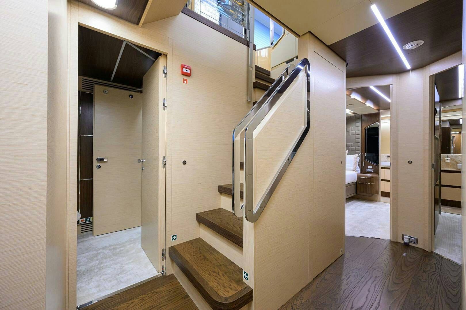 a hallway with doors and windows aboard UPTIGHT Yacht for Sale