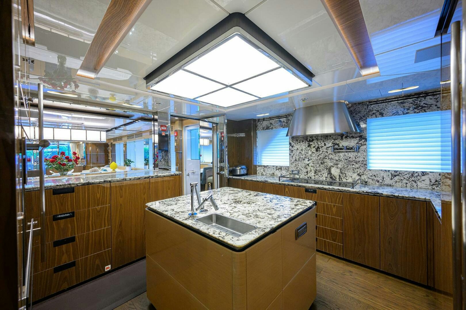 a kitchen with a large island aboard UPTIGHT Yacht for Sale