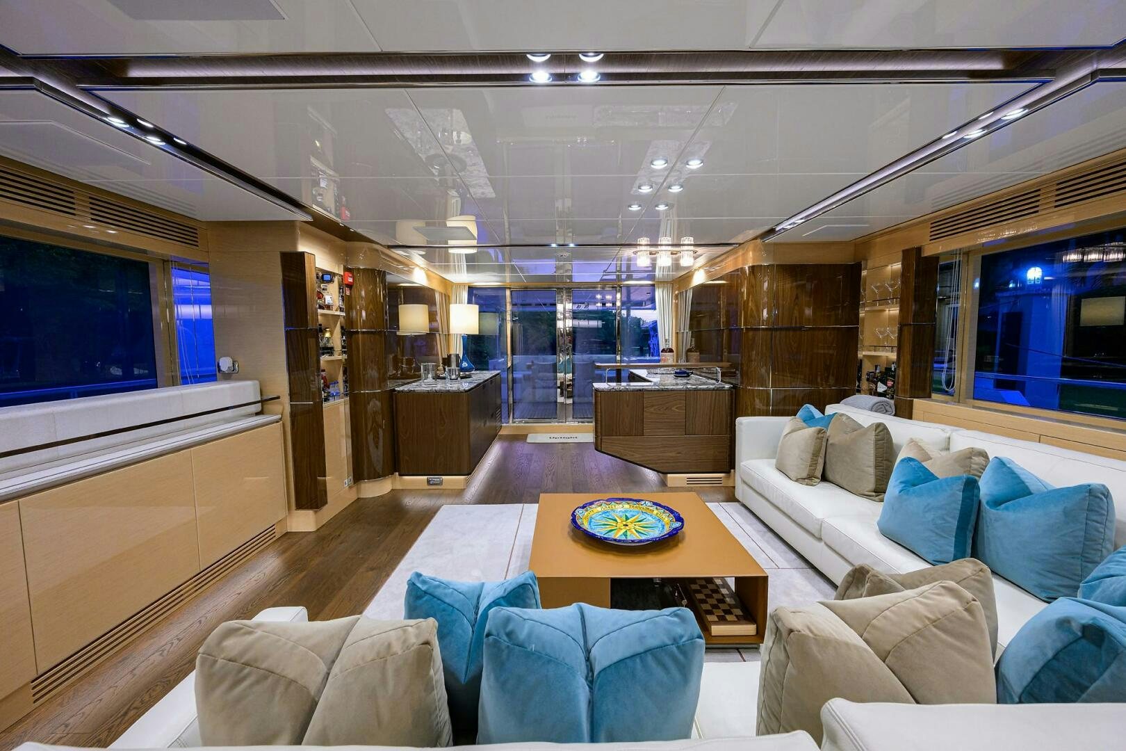 a living room with a large window aboard UPTIGHT Yacht for Sale