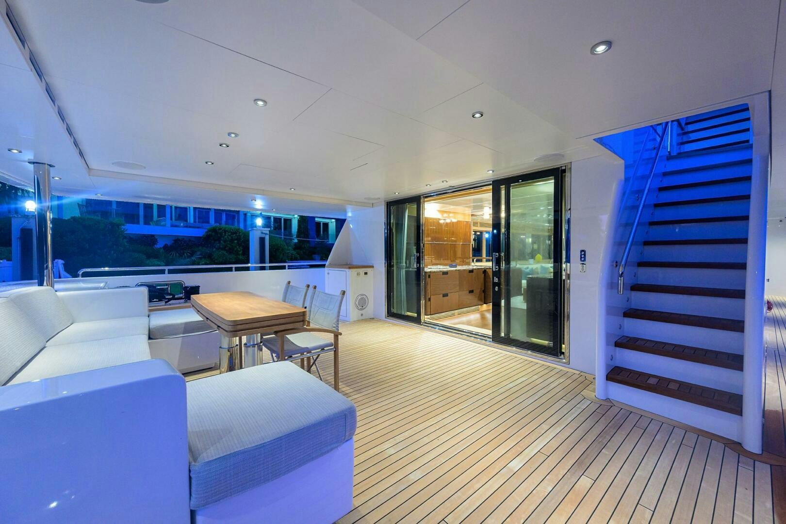 a room with a view of the water and the deck aboard UPTIGHT Yacht for Sale