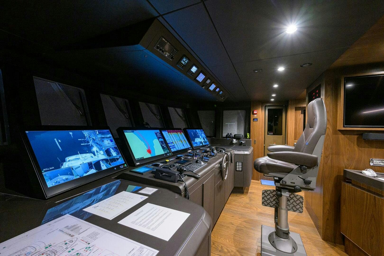 a room with several computers aboard UPTIGHT Yacht for Sale
