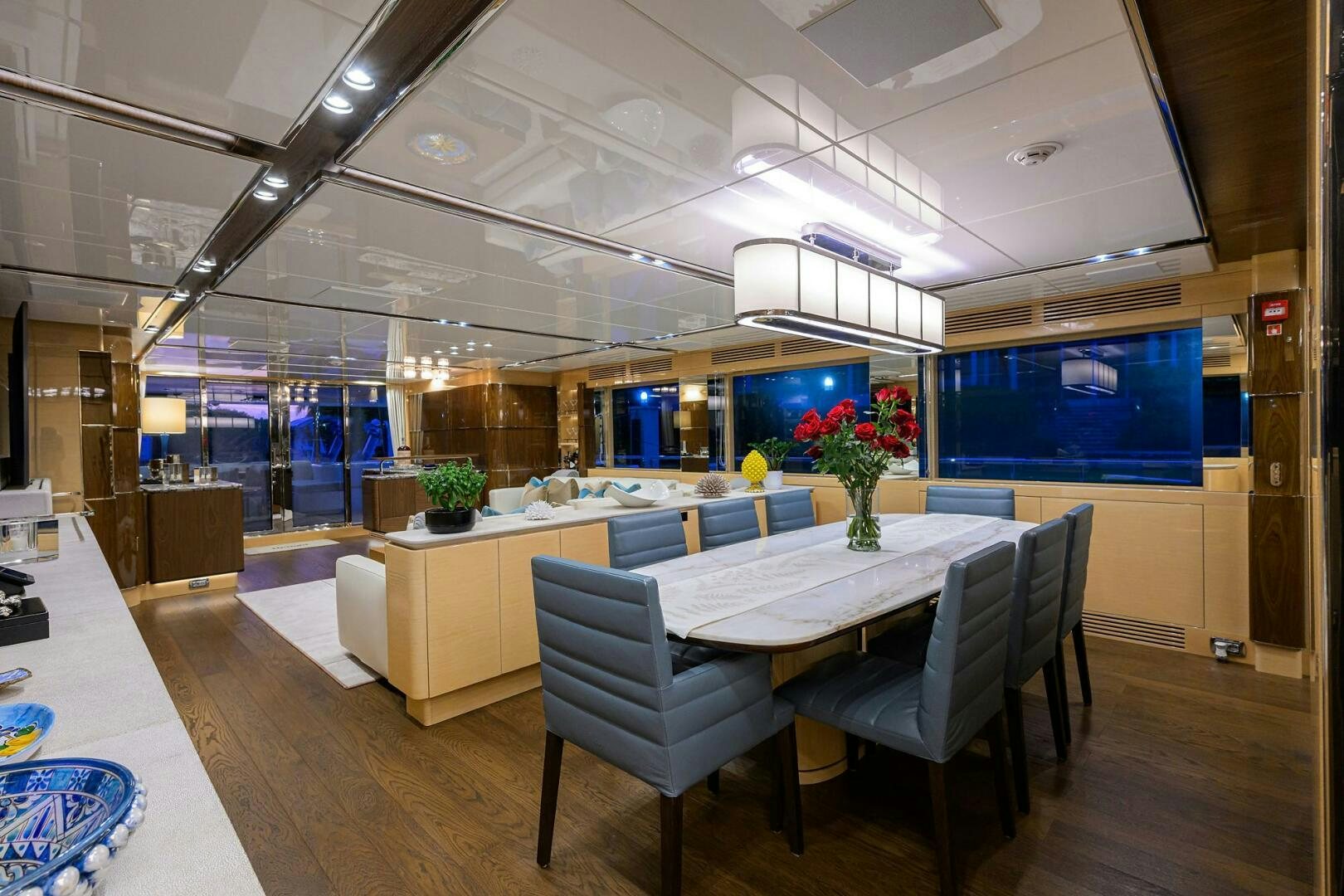 a large room with tables and chairs aboard UPTIGHT Yacht for Sale