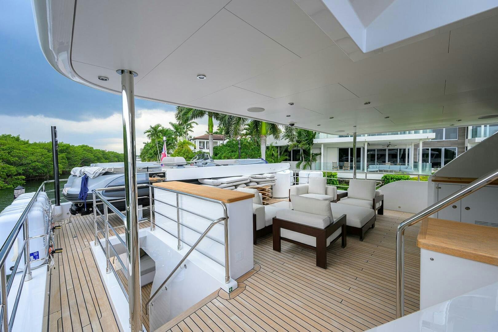 a large room with a deck and a pool aboard UPTIGHT Yacht for Sale