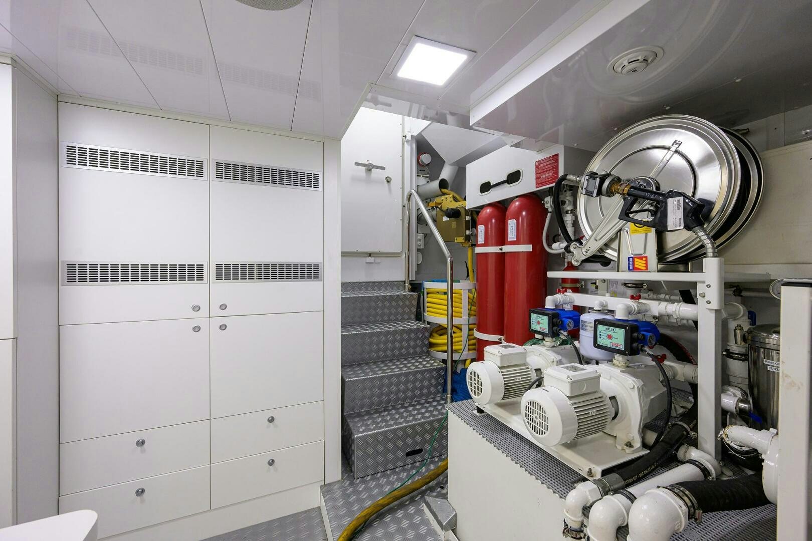 a room with machinery and equipment aboard UPTIGHT Yacht for Sale