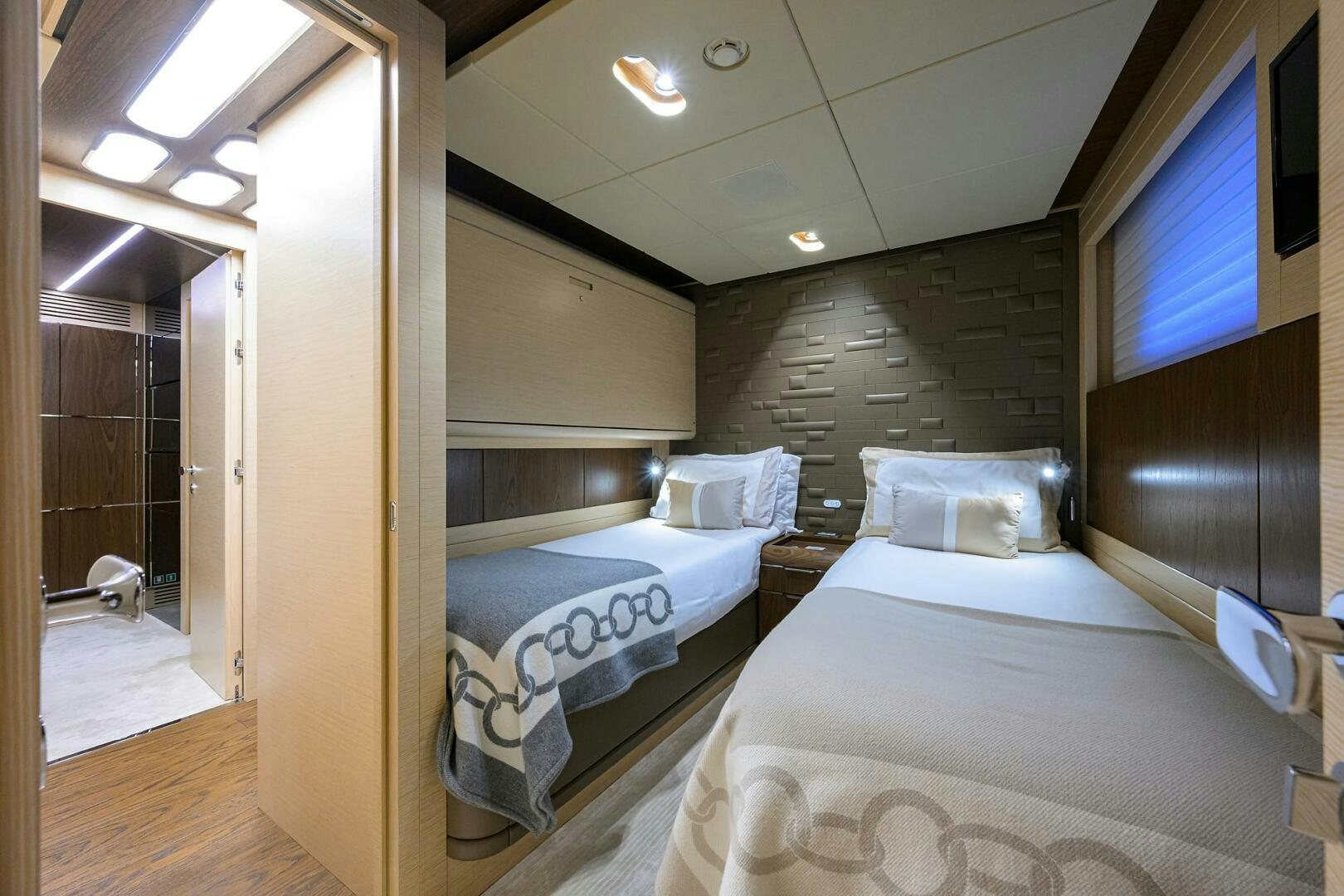 a room with two beds aboard UPTIGHT Yacht for Sale