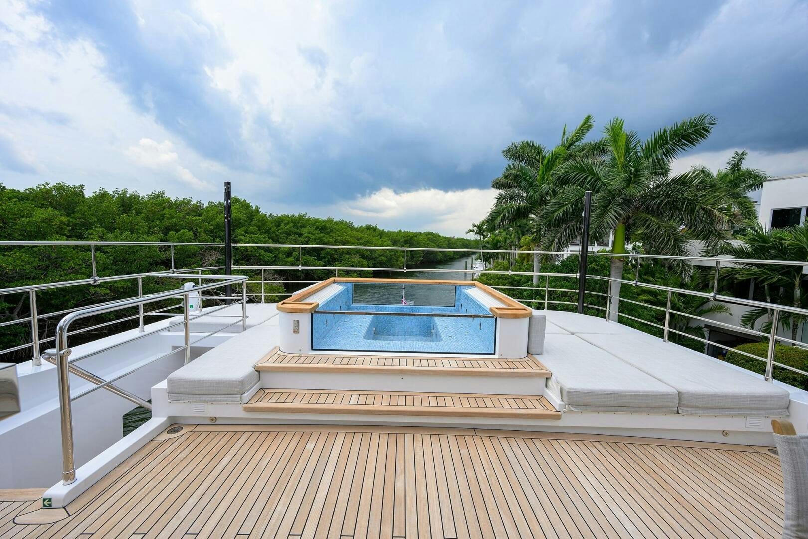 a swimming pool on a deck aboard UPTIGHT Yacht for Sale