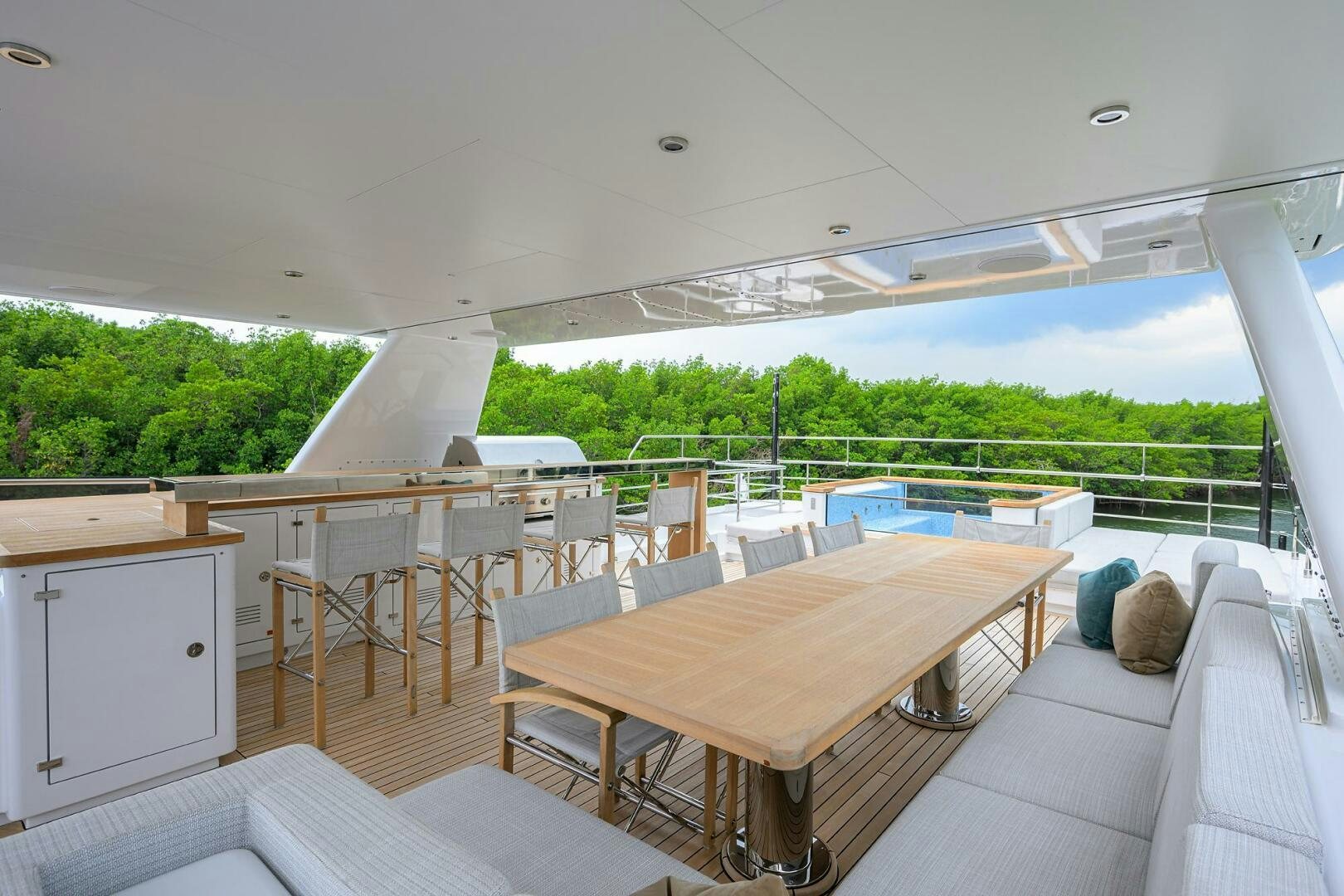 a room with a table and chairs aboard UPTIGHT Yacht for Sale