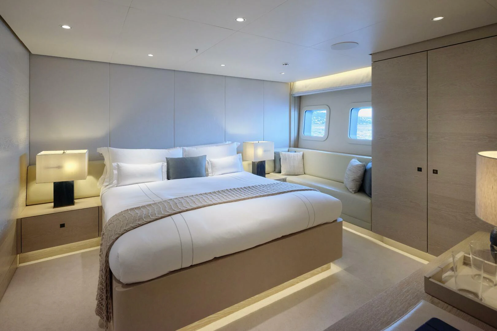 a room with a bed and a desk aboard SANAM Yacht for Sale