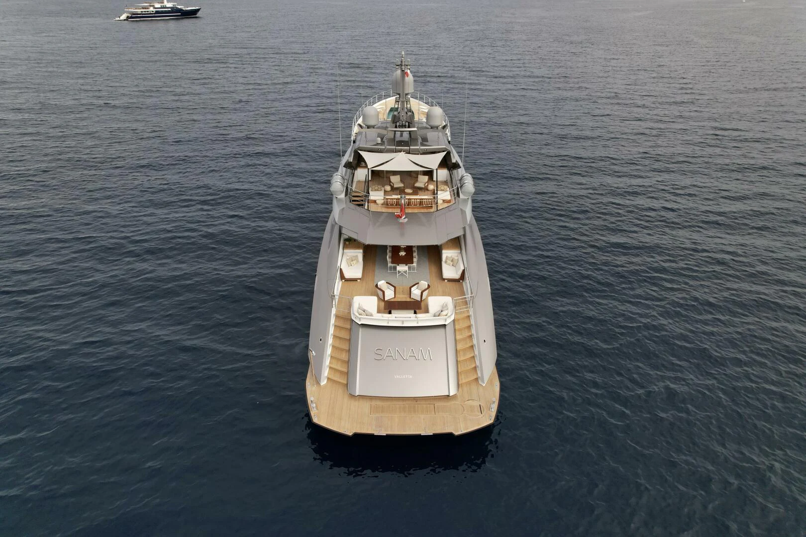 a small ship in the water aboard SANAM Yacht for Sale