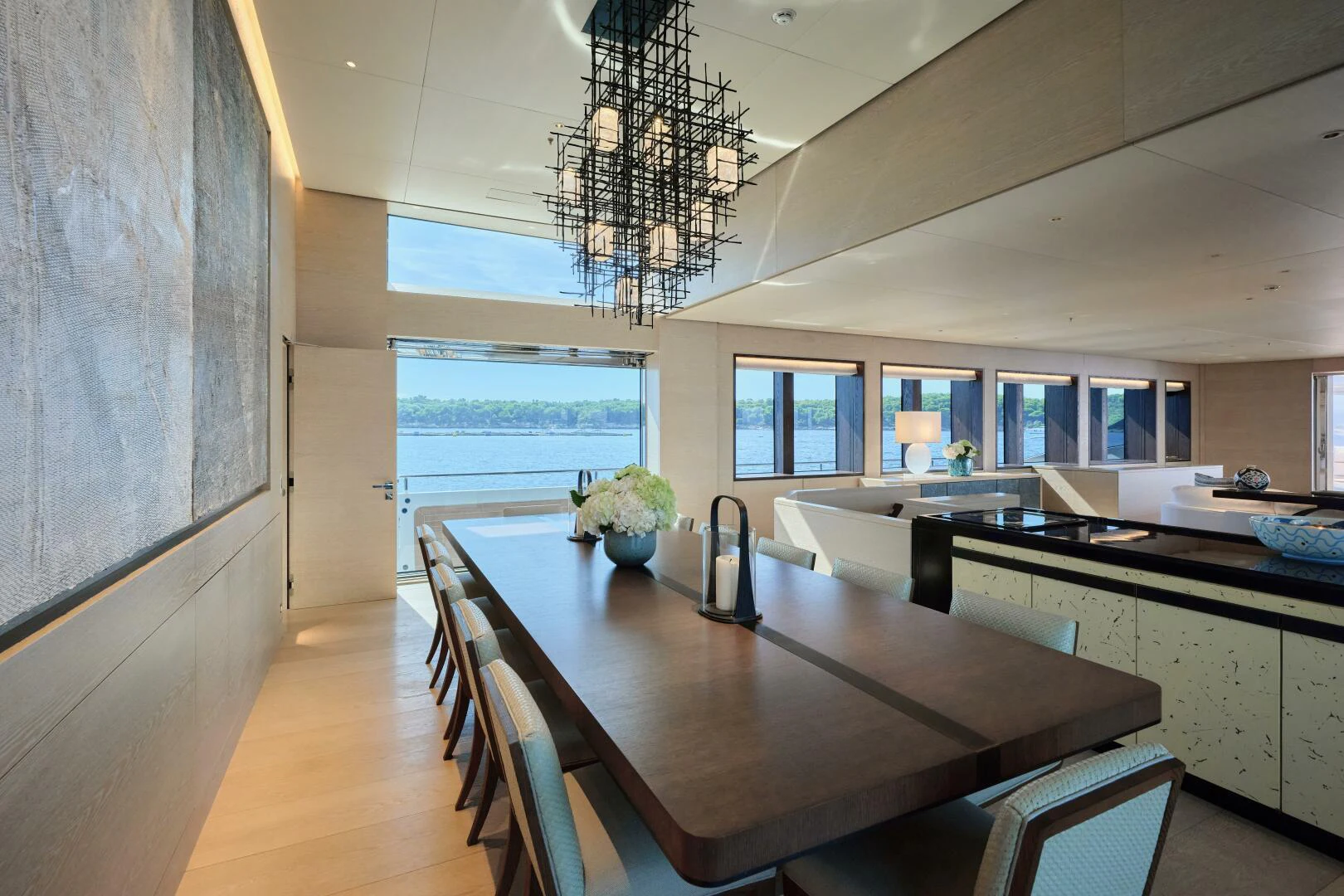 a kitchen with a large island aboard SANAM Yacht for Sale