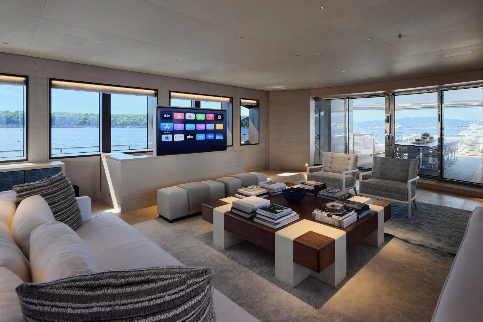 a living room with a large screen aboard SANAM Yacht for Sale