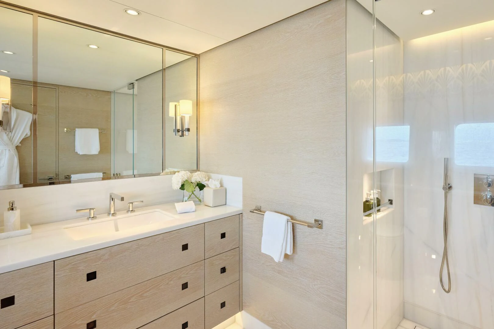 a bathroom with a large mirror aboard SANAM Yacht for Sale