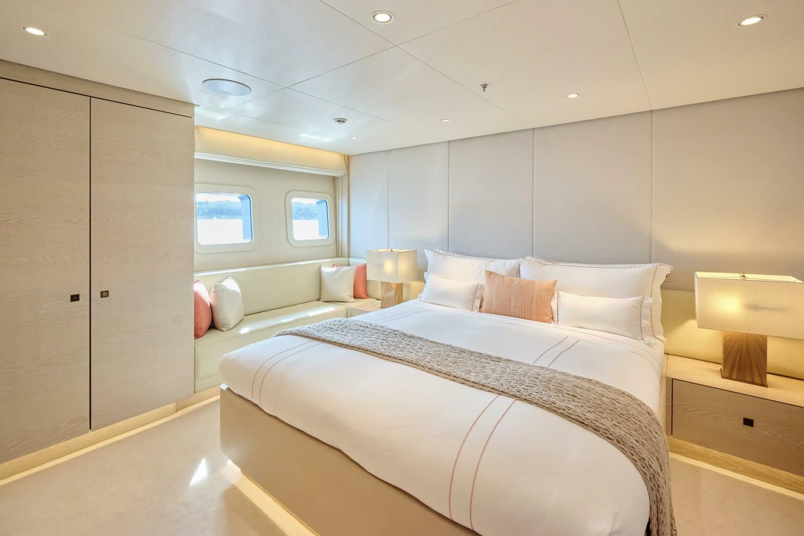a room with a couple of beds aboard SANAM Yacht for Sale