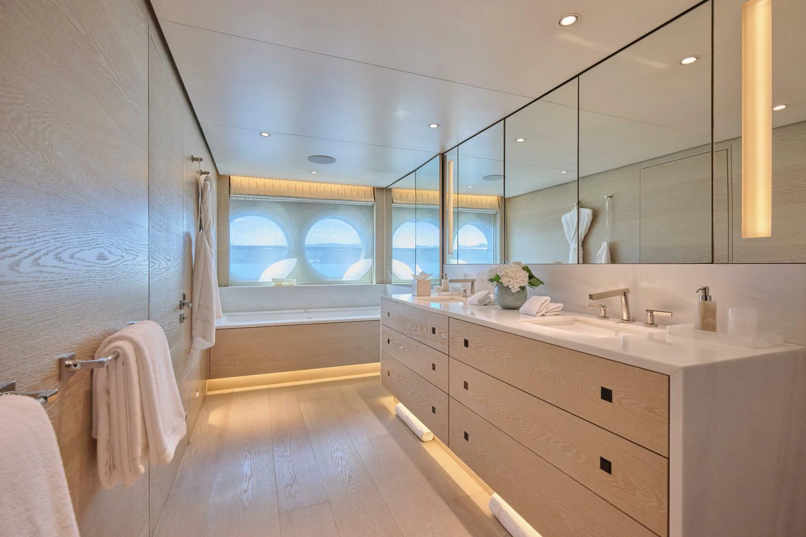 a bathroom with a large mirror aboard SANAM Yacht for Sale