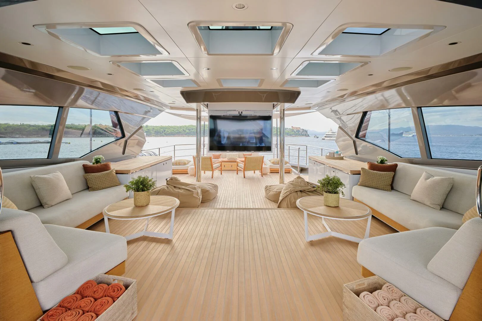 a living room with a large window aboard SANAM Yacht for Sale