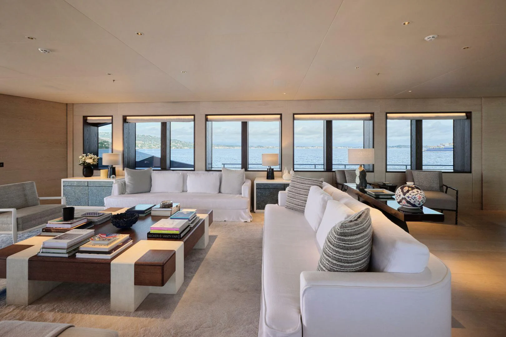 a living room with a large window aboard SANAM Yacht for Sale