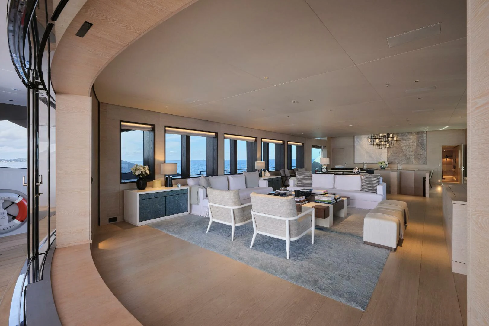 a living room with a large rug aboard SANAM Yacht for Sale